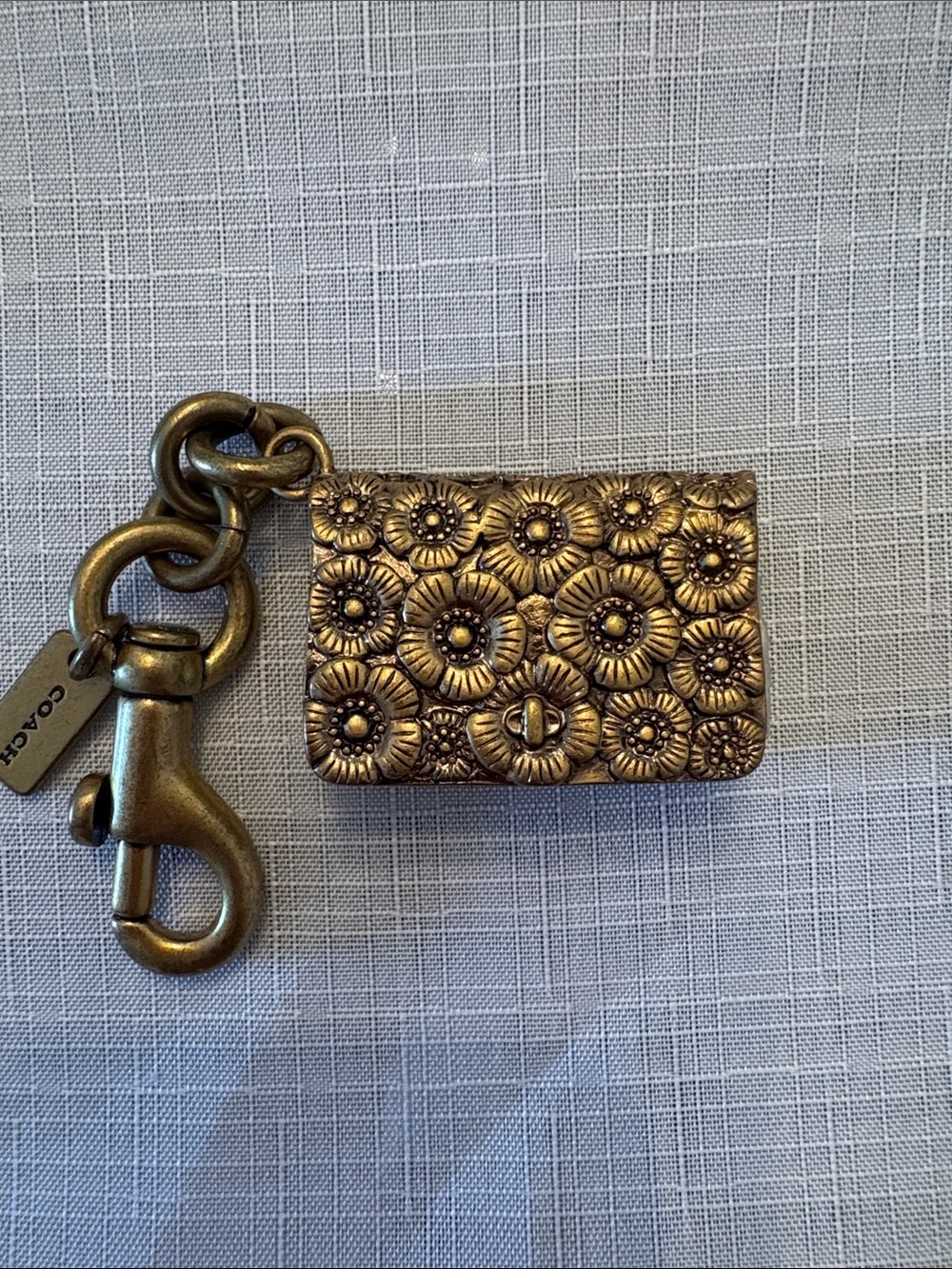 Coach Floral Embossed Brass-Tone Key Charm - Gold